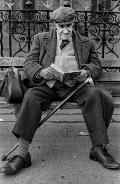 old man, sat reading, Boulevard, Blackburn 1983