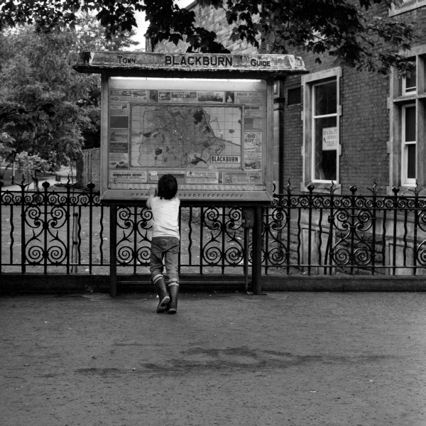 boy using 'electronic' Town Guide, Boulevard, Blackburn 1983