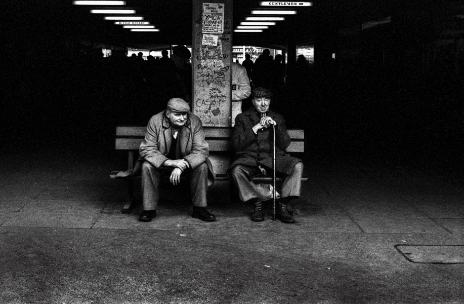 men sat between the two markets, Blackburn 1984