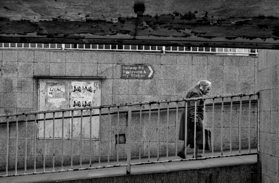 Old woman using subway near Boulevard, Blackburn