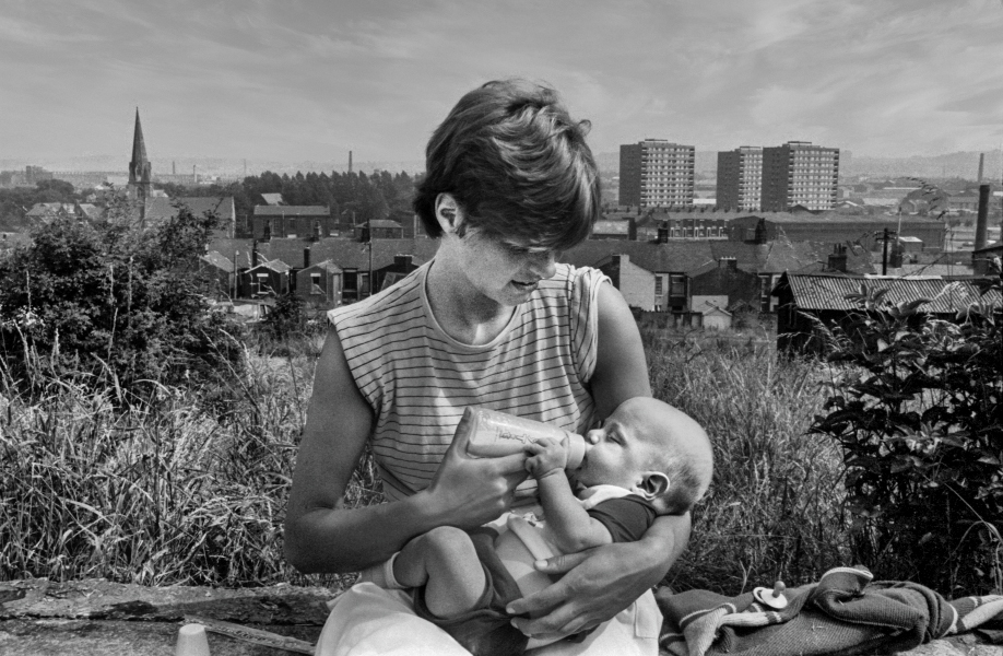 Mother feeding baby, Brookhouse area - Blackburn - A Town and its People by Christopher John Ball