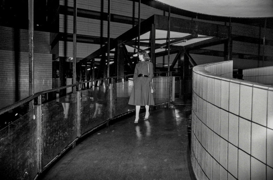 Woman using Spiral Staircase, Town Centre - Blackburn - A Town and its People by Christopher John Ball