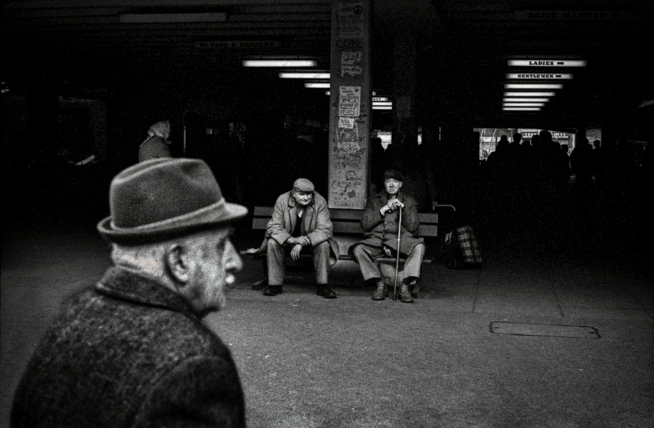 Two old men sitting between the two markets - Blackburn a Town and Its People