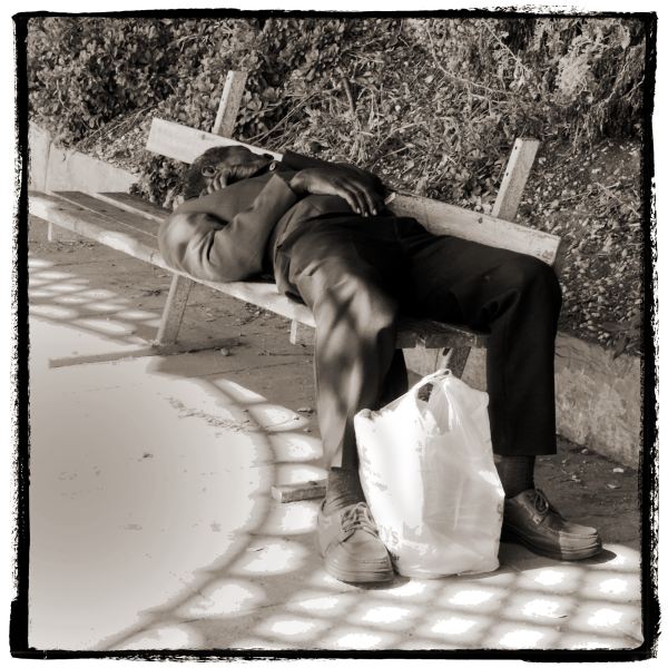 Rough Sleeper on Bench from Discarded a Photographic Essay by Christopher John Ball Photographer and Writer