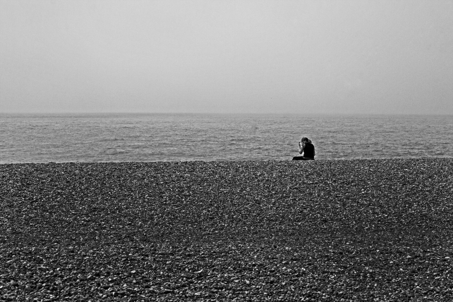 Woman on Pebble Beach, Hastings 2007 From British Coastal Resorts - Photographic Essay by Christopher John Ball